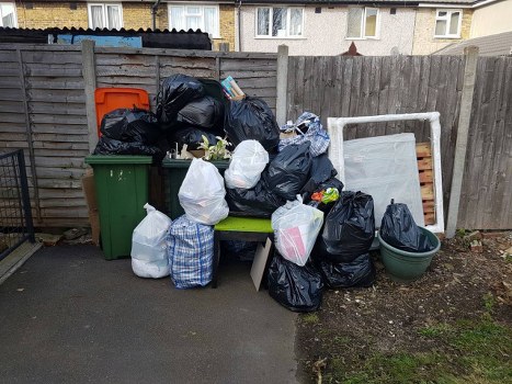 Rubbish removal service truck in Hoxton