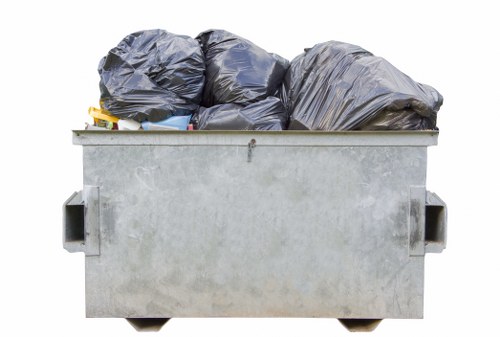 Skip container placed on residential property in Hoxton