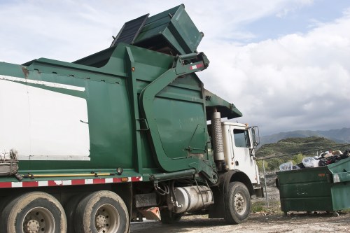 Eco-friendly waste removal vehicles in Hoxton